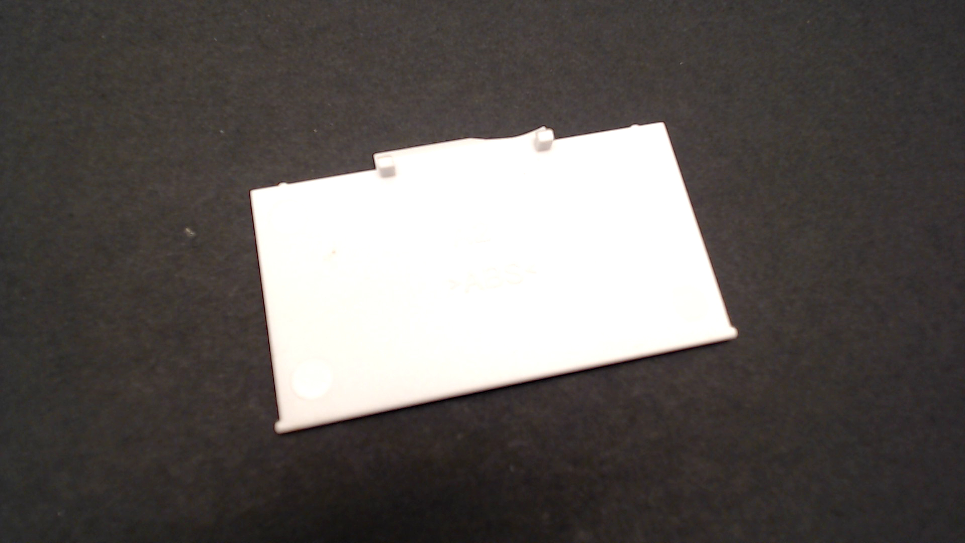 Makita SE00000283 BACK UP BATTERY COVER(WHITE)